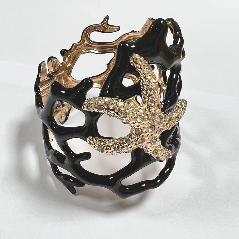 Irregular Hollowed-Out Starfish Coral Bangle Bracelet