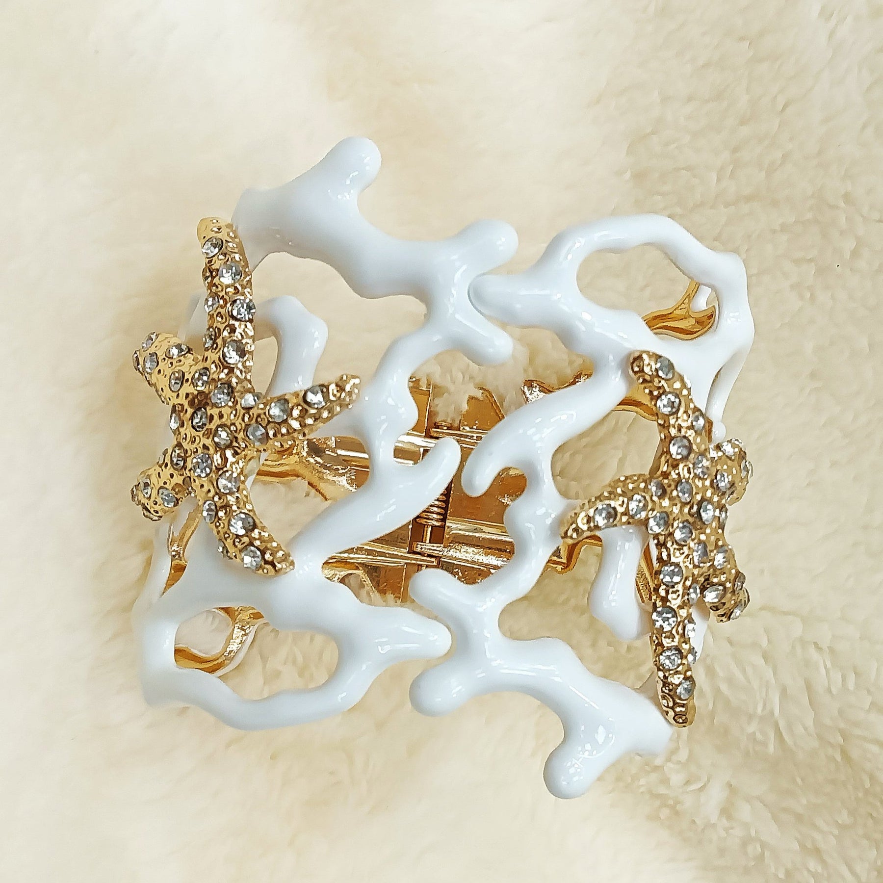 Irregular Hollowed-Out Starfish Coral Bangle Bracelet