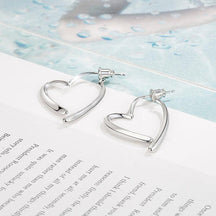 Stylish Heart Crossing Earrings - zuzumia